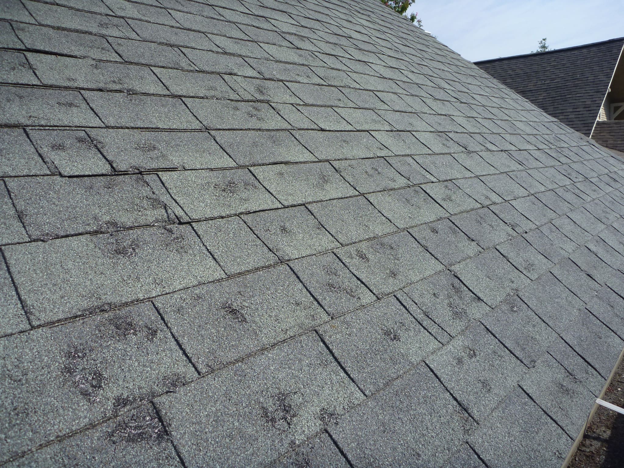 How to Spot Roof Damage After a Colorado Hailstorm / Sunset Restoration